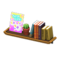 Wall-Mounted Bookshelf (Dark Brown - Children's Magazine) NH Icon.png