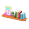 Wall-Mounted Bookshelf (Brown - Children's Magazine) NH Icon.png